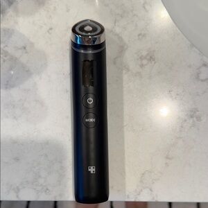 Black Electronic Skincare Device